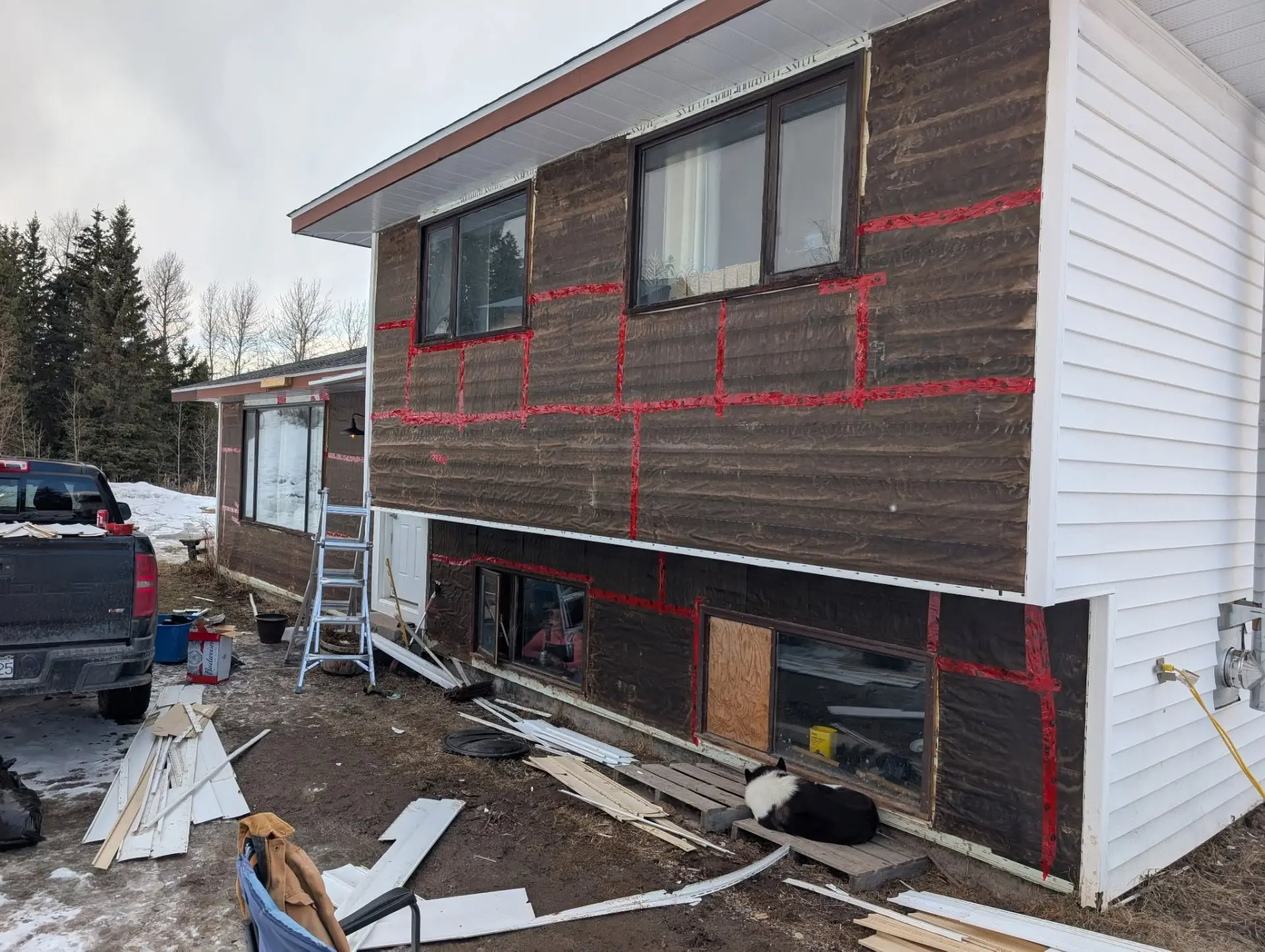After: siding torn off and home fully re-wrapped and sealed